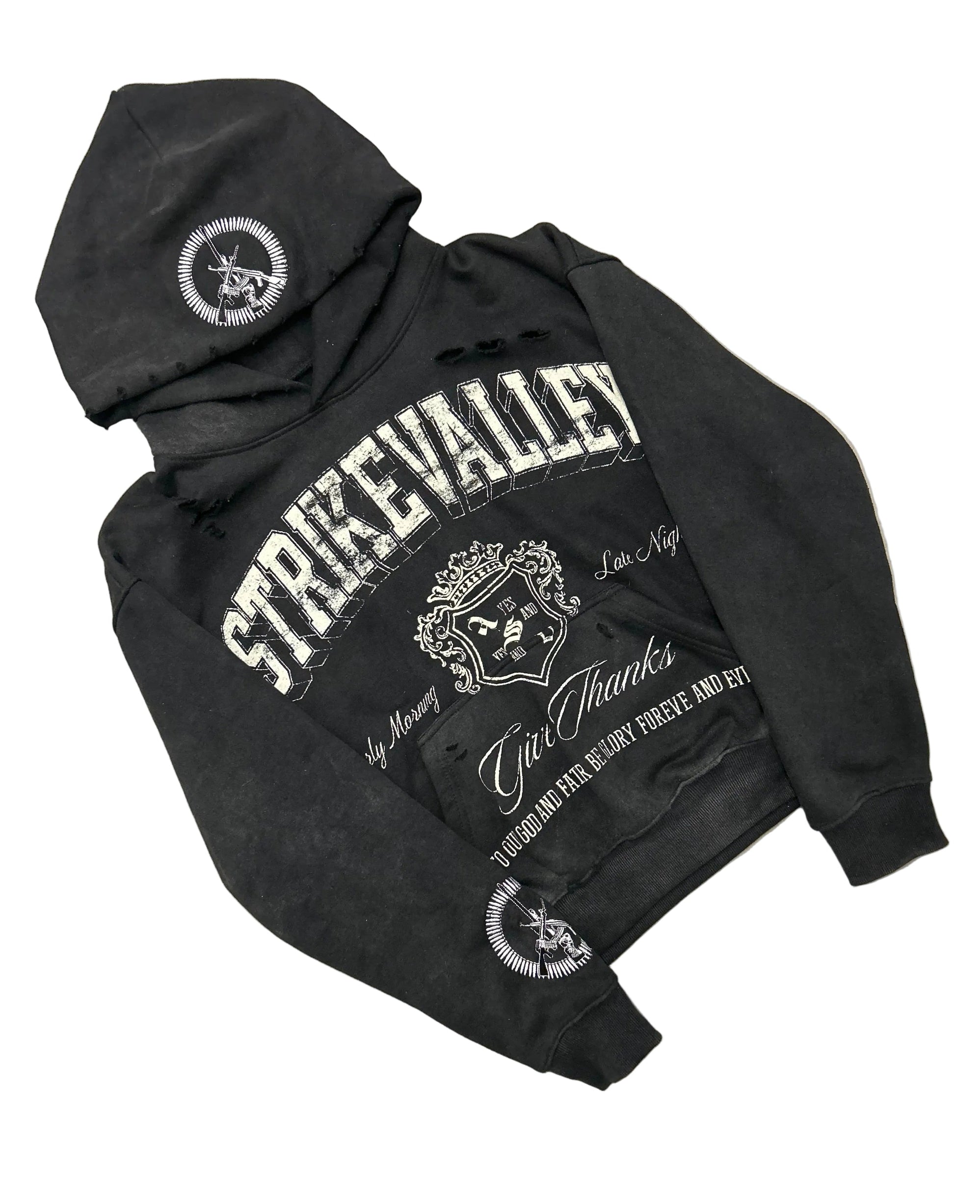 Black hoodie with white text and logos on a gray floor